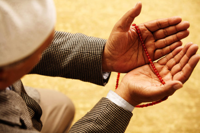 muslim man making duaa-Istikharah Signs of Response