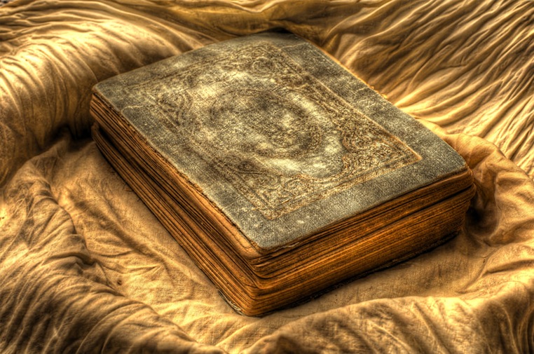 The Quran: From the Preserved Tablet to Humankind
