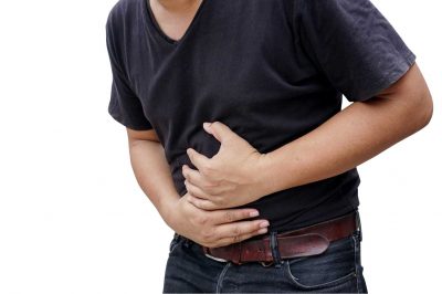 man suffering from stomachache