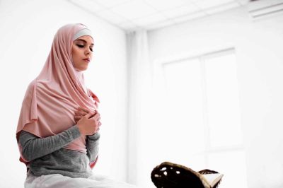 Muslim woman praying