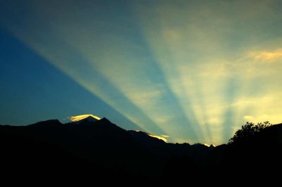 dawn landscape and the first rays of the sun in the dawning sky