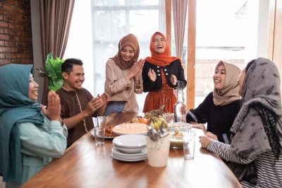 muslim friend and family laughing together