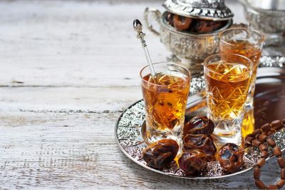 glass of water and dried dates