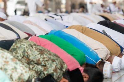 Muslims in sujud position in salah